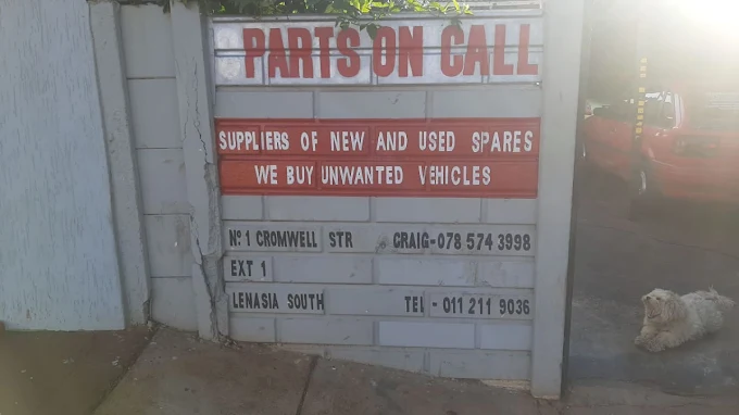 Wall of our premises showing Parts on Call logo and the wide range of parts we offer
